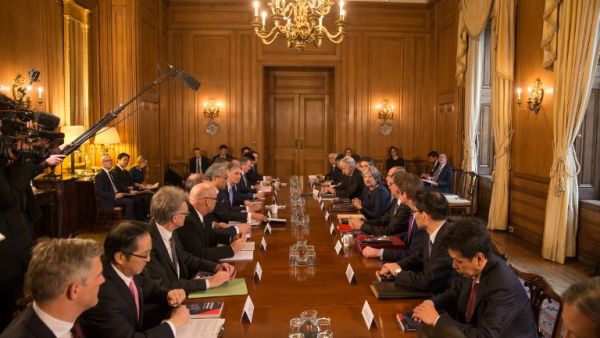Britain's Prime Minister Theresa May (6R) hosts a roundtable with Japanese investors in the UK at 10 Downing Street in central London on Feb. 8, 2018 hosted by Britain's Prime Minister Theresa May. 
(Daniel LEAL-OLIVAS / AFP)