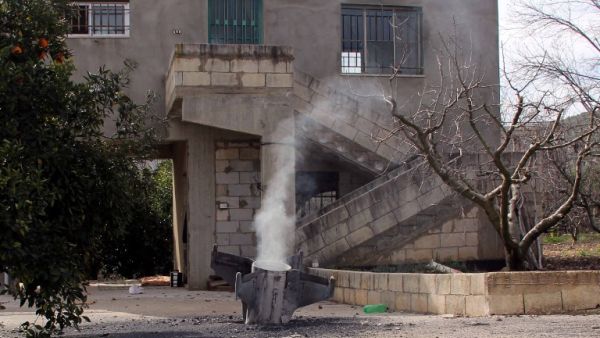 A picture taken on February 10, 2018, shows the remains of a missile that landed in the southern Lebanese village of Kaoukaba, near the border with Syria, after Israel's military attacked 12 Syrian and Iranian targets inside Syria on in what it described as "large-scale" raids following an exchange of fire earlier in the day.
(ALI DIA / AFP)