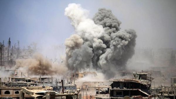 Smoke rises from buildings following a reported air strike on a rebel-held area in the southern Syrian city of Daraa. (AFP/File)