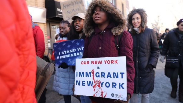 Hundreds of people demonstrate against racism in the Brooklyn neighborhood of Bay Ridge on Martin Luther King (MLK) Day on Jan. 15, 2018 in New York City (SPENCER PLATT / GETTY IMAGES NORTH AMERICA / AFP)