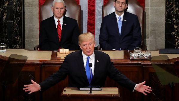 U.S. President Donald J. Trump delivers the State of the Union address as U.S. Vice President Mike Pence (L) and Speaker of the House U.S. Rep. Paul Ryan (R-WI) (R) look on in the chamber of the U.S. House of Representatives Jan. 30, 2018 in Washington, DC (CHIP SOMODEVILLA / GETTY IMAGES NORTH AMERICA / AFP)
