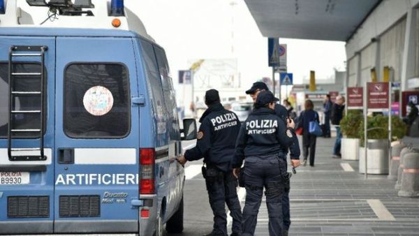 Italian police officers (AFP/File Photo)