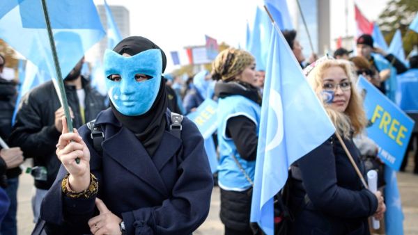 Uighurs demonstrate against China outside of the United Nations (UN) offices during the Universal Periodic Review of China by the UN Human Rights Council in Geneva on Tuesday. ( AFP/ File)
