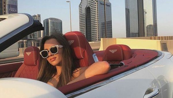 Maria', whose full name is not known, is seen behind the wheel of a Bentley (Instagram)