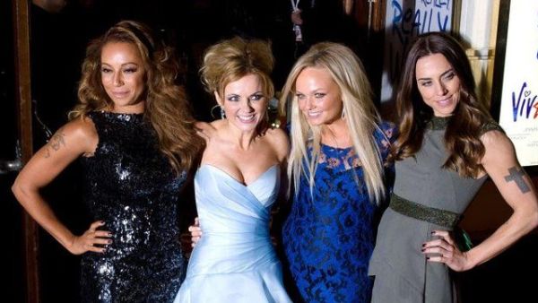 The band, minus pop star-turned-fashion designer Victoria Beckham, released details of a comeback tour, which will see them play Wembley Stadium, Britain’s biggest venue. (Source: AFP)