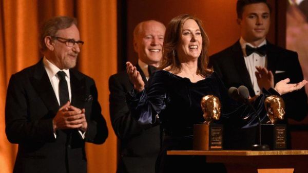 Kathleen Kennedy and Frank Marshall accept the Irving G. Thalberg Memorial Award from Steven Spielberg onstage during the Academy of Motion Picture Arts and Sciences’ 10th annual Governors Awards. (Source: AFP) Kathleen Kennedy and Frank Marshall accept the Irving G. Thalberg Memorial Award from Steven Spielberg onstage during the Academy of Motion Picture Arts and Sciences’ 10th annual Governors Awards. (Source: AFP)
