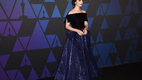 Lily Collins wore a gown by Georges Chakra. (Source: AFP) Lily Collins wore a gown by Georges Chakra. (Source: AFP)