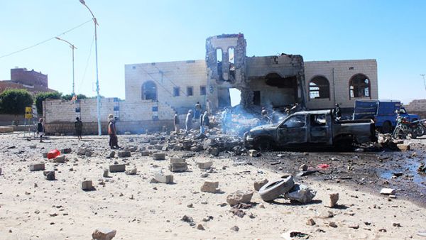 People inspect damage at the site of air strikes (AFP/File Photo)