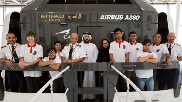 A student learns from an Etihad Airways captain about adjusting to altitude and weather conditions in the air.