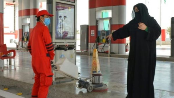 Woman in managerial role at service station where she works (AFP/File Photo)	