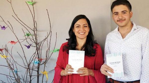 Omar Abu Agha poses with Skyline Sushi partner Natasha Quariab at the book launch in Amman, on Saturday (Skyline Sushi)