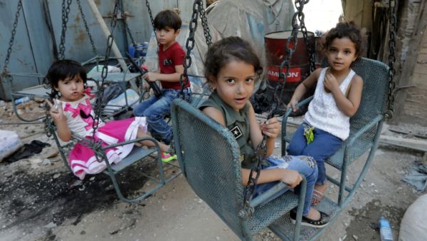 Syrian refugee children in Lebanon in a makeshift playground (AFP/File Photo)	