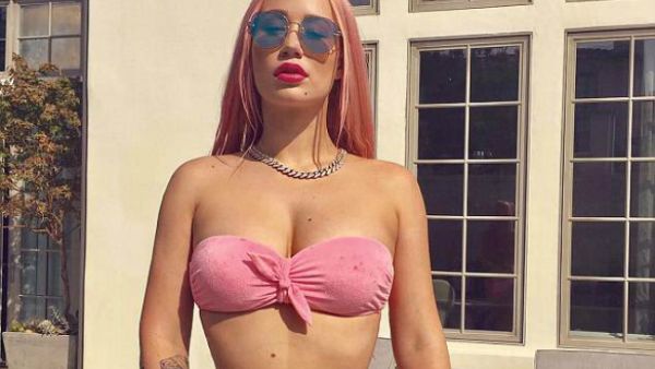 Getting curious: Iggy Azalea wants people to stop 'automatically assuming' relationships are all 'traditional' as she questions polyamorous lifestyles on Twitter on Monday (Source: Iggy Azalea - Instagram)