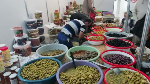 Local producers showcase their olive products during the 19th National Olive Festival, which concluded Saturday evening, at Al Hussein Park in Amman. (Photo courtesy of National Olive Festival Facebook page)