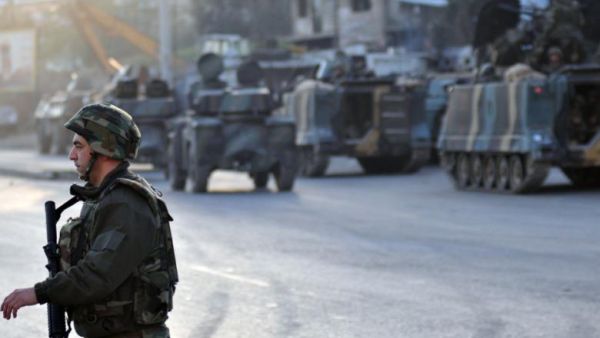 Bashrawi turned himself in after entering into Lebanon from Syria (AFP/File)