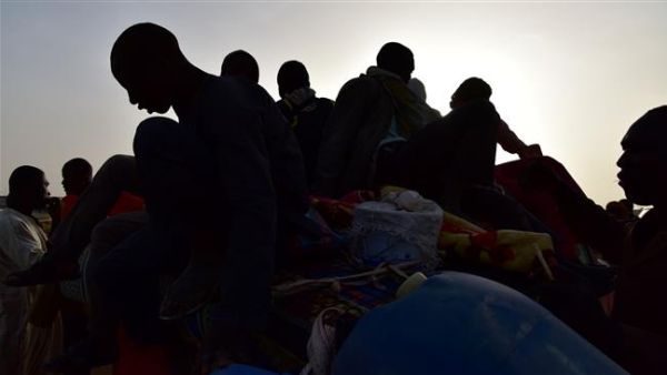 A picture taken on March 31, 2017 shows West African refugees on a pickup truck returning from Libya due to violence, in Agadez, northern Niger, following their failed attempt to reach Europe (AFP)