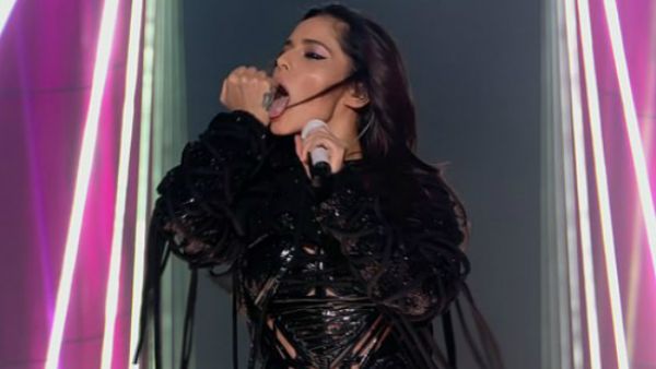 Racy: During one particularly seductive move, the singer licked her hand (Source: ITV) Racy: During one particularly seductive move, the singer licked her hand (Source: ITV)