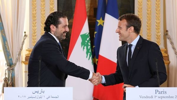 Macron and Hariri shakes hands in September, 2017, AFP/File