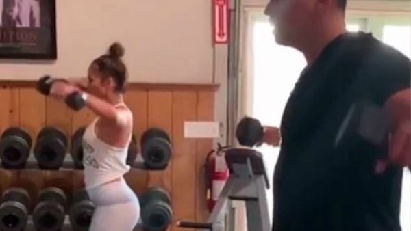 Pumping iron: Things are still going strong between pop diva Jennifer Lopez and her retired Yankee boyfriend Alex Rodriguez, who hit the gym together on Saturday morning (Source: Alex Rodriguez - Instagram)