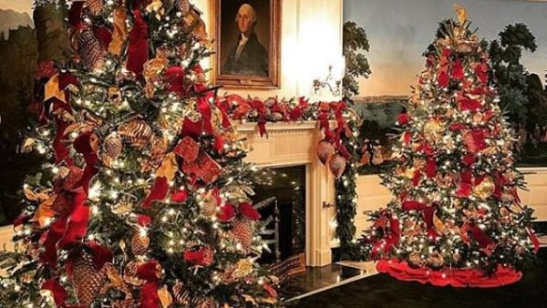 First lady Melania Trump unveiled the White House Christmas theme on Monday, wearing a pair of red leather gloves that matched the gleaming ornaments on the tree. (Twitter)
