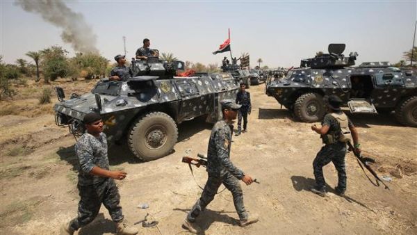 The bomber opened fire on Sunni tribesmen manning a checkpoint in al-Kasara (AFP/File Photo)