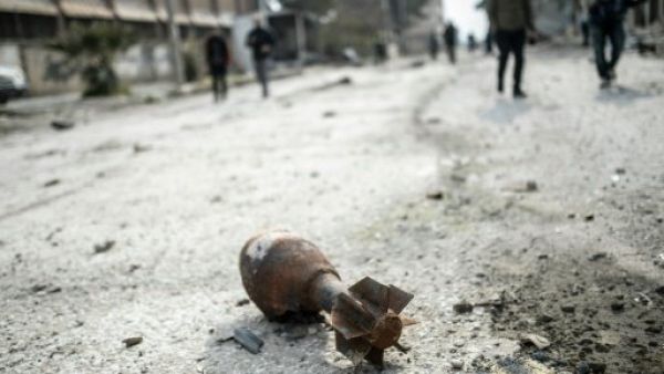 A mortar shell sits in the center of the Syrian border town of Kobane, known as Ain al-Arab, on January 28, 2015. (AFP/File)