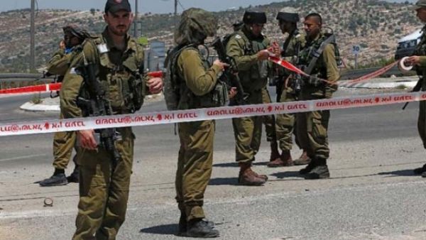 Israeli police continue to search the area for suspects. (AFP/File) Israeli police continue to search the area for suspects. (AFP/File)