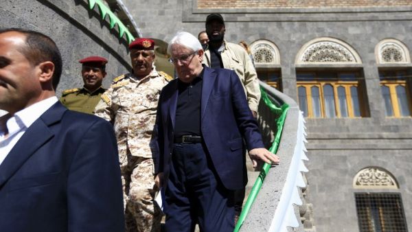 UN envoy to Yemen Martin Griffiths (C) leaves following his meeting with the President of the Huthi Revolutionary Committee, in the capital Sanaa (AFP)