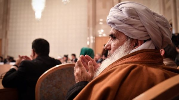 Participants attend the opening of the two-day talks of the Taliban and Afghan opposition representatives at the President Hotel in Moscow on February 5, 2019. 
Yuri KADOBNOV / AFP