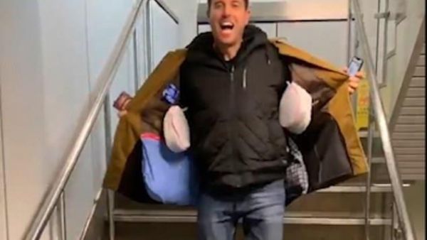 Lee appeared to make it through the check-in for his flight with all the belongings he had stitched into his coat instead of taking a suitcase (Facebook)