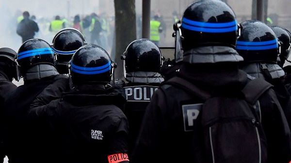 French police union bosses threatened their own 'Blue Vests' if President Emmanuel Macron fails to listen to their calls for a halt to planned cuts to the police force (AFP)