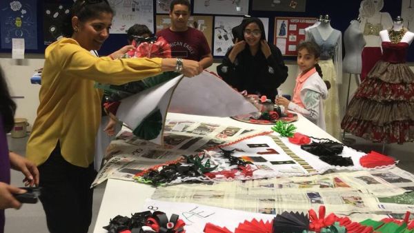 Students creating sustainable fashion designs at the Dubai Saturday Clubs (Twitter)