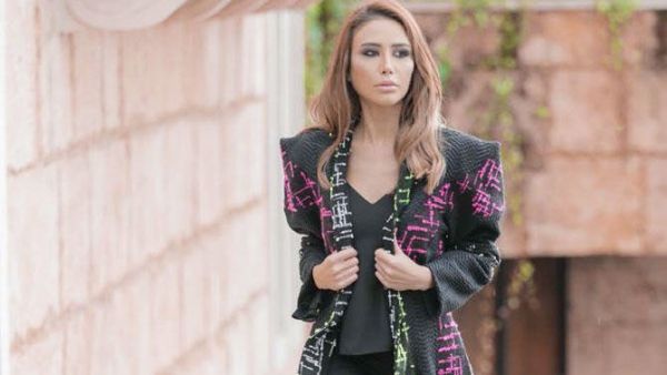 A catwalk with massive floral decorations, smoke and fog machines, and even confetti cannons, provided a spectacular backdrop as the Saudi fashion house JINO showcased (Twitter)