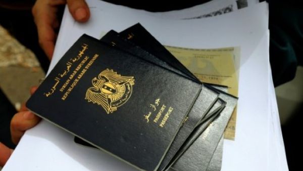 Syrian passports are coming under fire. (AFP/File)