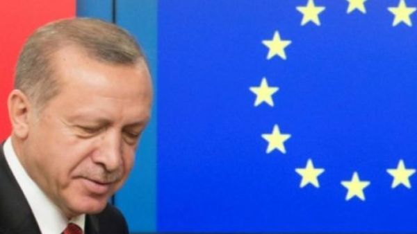 Turkish President Recep Tayyip Erdogan beside EU flag. (AFP/File Photo)