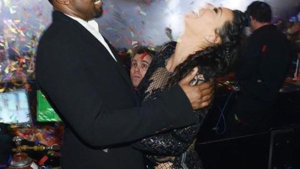 Kanye and Kim in a tender embrace.