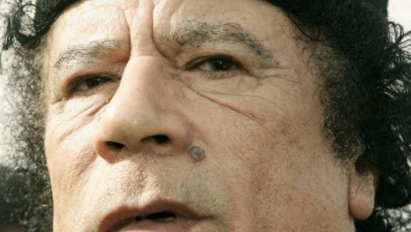 الرئيس الليبي الراحل معمر القذافي. 