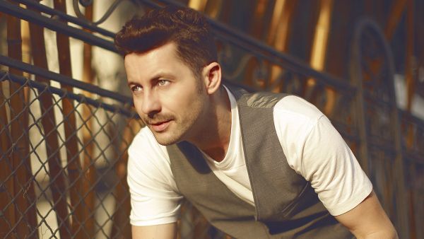 Adrian is best known for creating, producing and singing in the dance group Akcent. (Adrian Sina website)