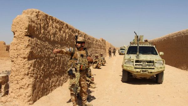 Afghan National Army commandos take position during a military operation in Helmand province on October 9, 2016. (AFP/Noor Mohammad)