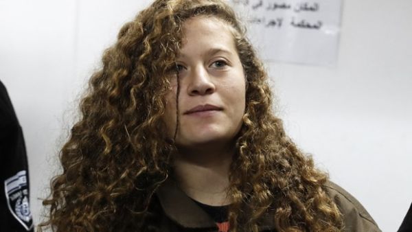 Sixteen-year-old Ahed al-Tamimi stands for a hearing in the military court (AFP/File Photo)	