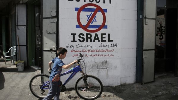 The BDS movement was founded in July 2005 by a swath of Palestinian civil society as a peaceful movement to restore Palestinian rights in accordance with international law. (AFP/File) 