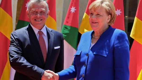Jordanian King Hussein al Abdullah in Amman with Angela Merkel (Twitter)