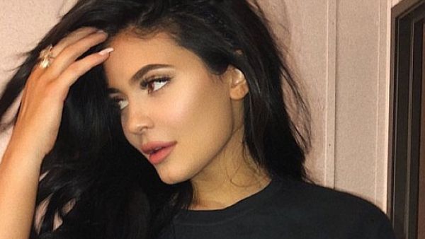 The 20-year-old reality star commanded attention as she flaunted her toned tummy in a cropped tee with the caption: 'B-day collection launching August 6th!' (Instagram)