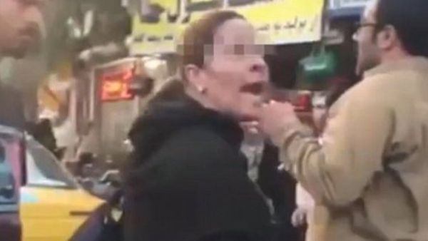 Brave Iranian woman confronts a cleric (Twitter)
