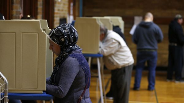 An Arab American voter casts her vote in  Dearborn, US. (AFP/File) 