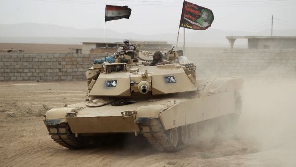 Soldiers from Iraq's 16th Division retook a series of villages north of Mosul, while pro-government paramilitary forces said they captured villages southwest of the city. (AFP/Ahmad Al-Rubaye)