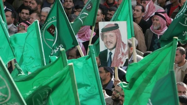 Jordanians wave Muslim Brotherhood flags in Amman in 2007 (AFP/File)