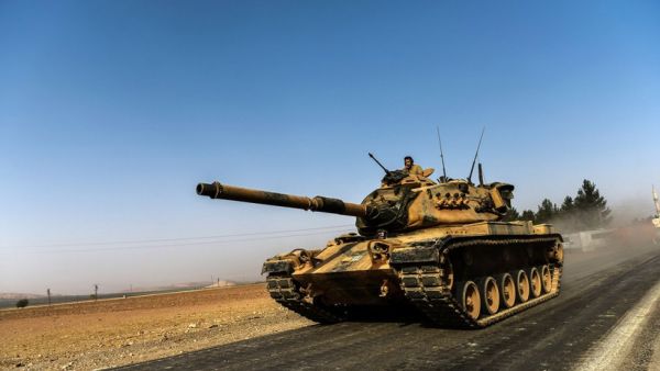 A Turkish army tank in the border city of Karkamis drives towards Syria. (AFP/Bulent Kilic) 