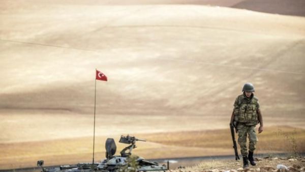 A Turkish soldier patrols the volatile border with Syria. (AFP/File)