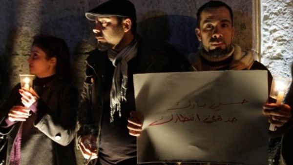 سوريون في تجمع مؤيد لثورة مصر.